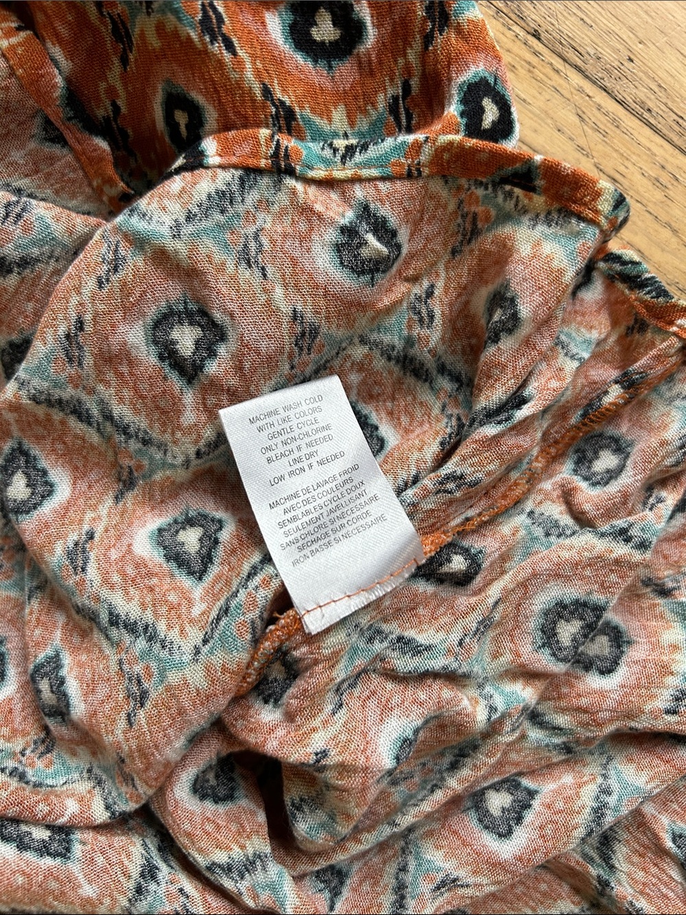 🌸3 FOR $20🌸
DR2 Rust and Teal Geometric V-Neck Cap Sleeve Blouse - Picture 7 of 7